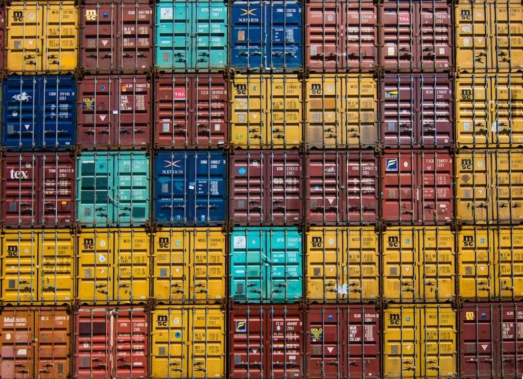 Colorful shipping containers stacked on top of each other.
