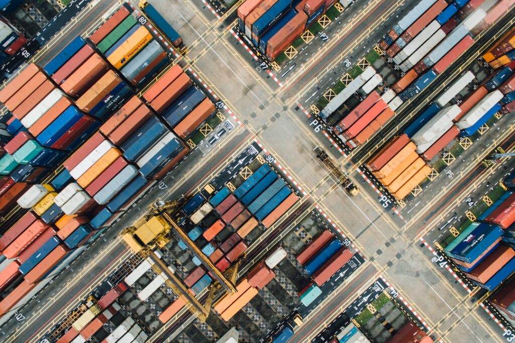 An aerial view of containers in a port.